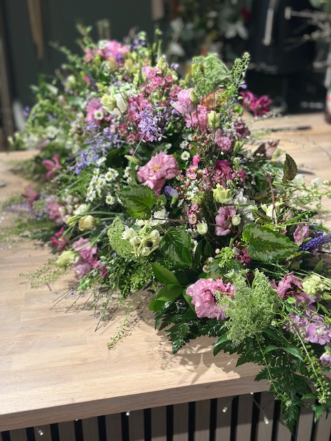 Floral arrangement created by Carol Evelyn Florist